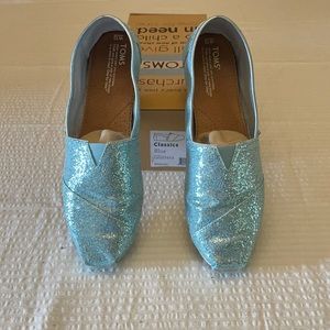 Tom’s Size 12 blue Glitter flat.